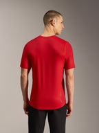 Maglia MTB A-Dura Ride rossa a maniche corte, vista posteriore in tessuto jacquard con orlo allungato e logo discreto.