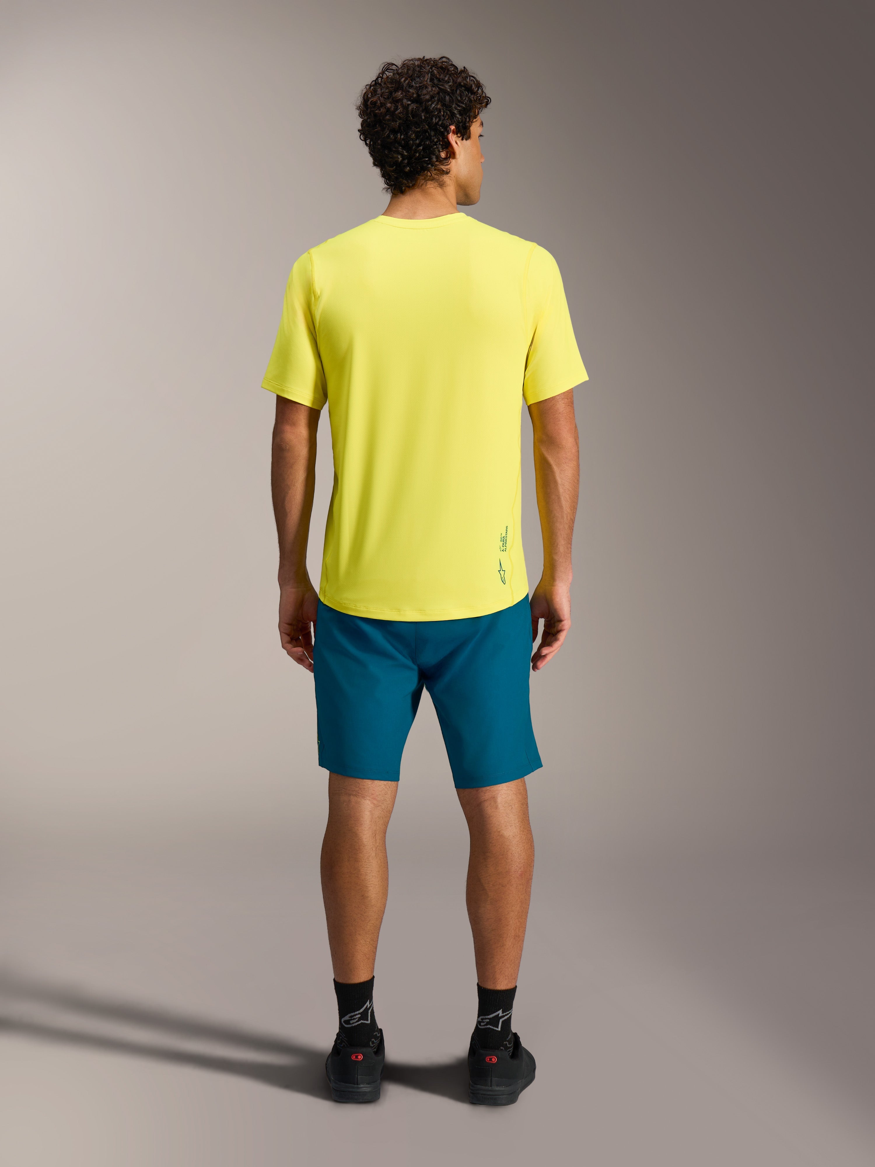 Maglia Alpinestars A-Dura Ride Giallo Fluo, vista posteriore di maglia MTB traspirante con vestibilità casual.