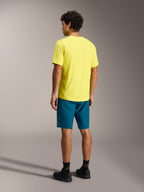 Maglia A-Dura Ride Giallo Fluo a maniche corte, vista posteriore con design a coda allungata per la MTB.