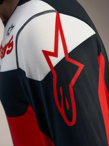 Maglia Alpinestars A-Dura Race rossa e nera, dettaglio logo a stella su tessuto jacquard traspirante a maniche lunghe.