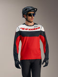 Maglia A-Dura Race maniche lunghe rossa, nera e bianca con logo Alpinestars, ideale per prestazioni MTB.