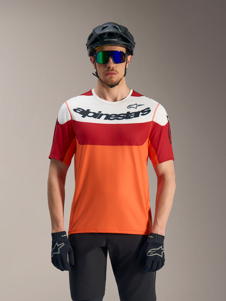 Alpinestars A-Dura Race Jersey, maglia MTB a maniche corte a blocchi arancione, rosso e bianco con logo nero.