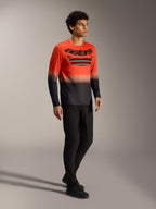 Maglia Alpinestars A-Dura ASTARS 2.0 a maniche lunghe arancione e nera con logo, per performance in mountain bike.