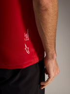 Maglia Alpinestars A-Dura ASTARS 2.0 rossa, dettaglio branding bianco e tessuto jacquard per mountain bike.