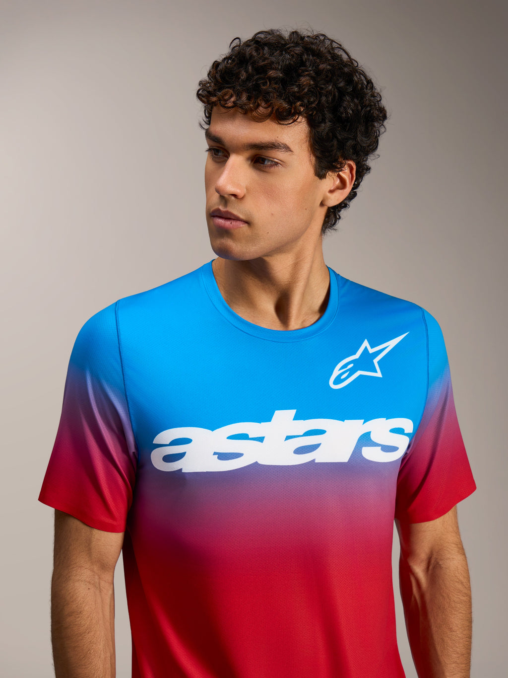 Maglia Alpinestars A-Dura ASTARS 2.0 a maniche corte, sfumatura rosso e blu con logo bianco per MTB.