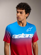 Maglia Alpinestars A-Dura ASTARS 2.0 a maniche corte, sfumatura rosso e blu con logo bianco per MTB.