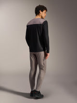 Alpinestars A-Dura Elite 2.0, maglia MTB a maniche lunghe nera e grigia traspirante, vista posteriore su modello.