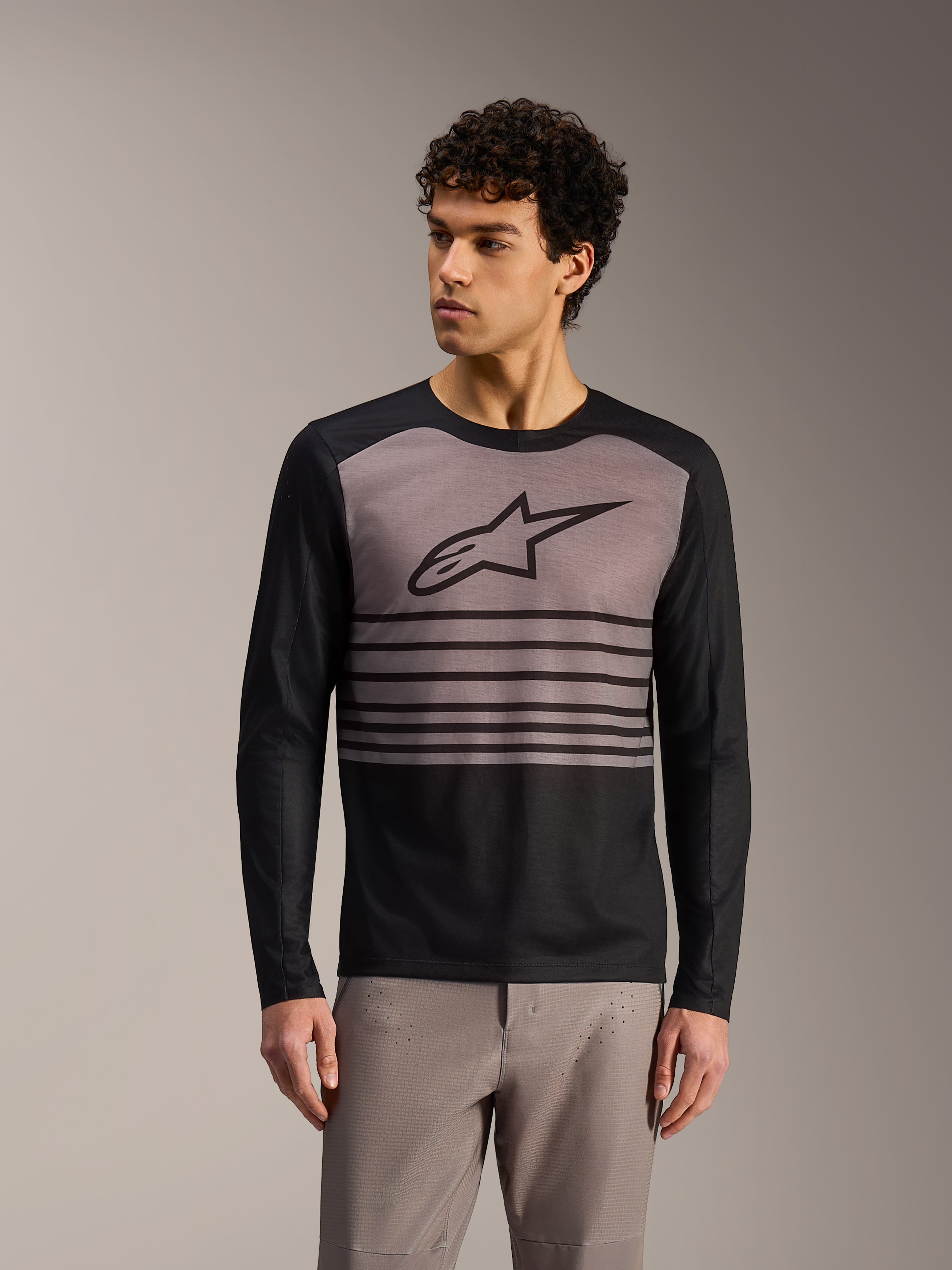 Alpinestars A-Dura Elite 2.0, maglia MTB a maniche lunghe nero e grigio color-block con logo sul petto, design tecnico.
