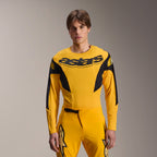 Alpinestars Limited Edition A-Supra Melt Gold Gear-Set, maglia MTB a maniche lunghe gialla e pantaloni coordinati, marchio astars nero sul petto, vestibilità atletica per mountain bike
