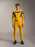 Set completo Limited Edition A-Supra Melt Gold, abbigliamento Mountain Bike Alpinestars, giallo scuro e nero, modello che indossa maglia a maniche lunghe con vistoso logo 'astars' sul petto e pantaloni tecnici coordinati, con ventilazione tagliata al laser sull'interno coscia e chiusura della vita a cricchetto, kit da gara professionale per MTB