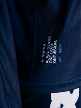 Maglia MTB Alpinestars A-Supra Elite blu, dettaglio tessuto microforato e slogan racing One Goal One Vision.