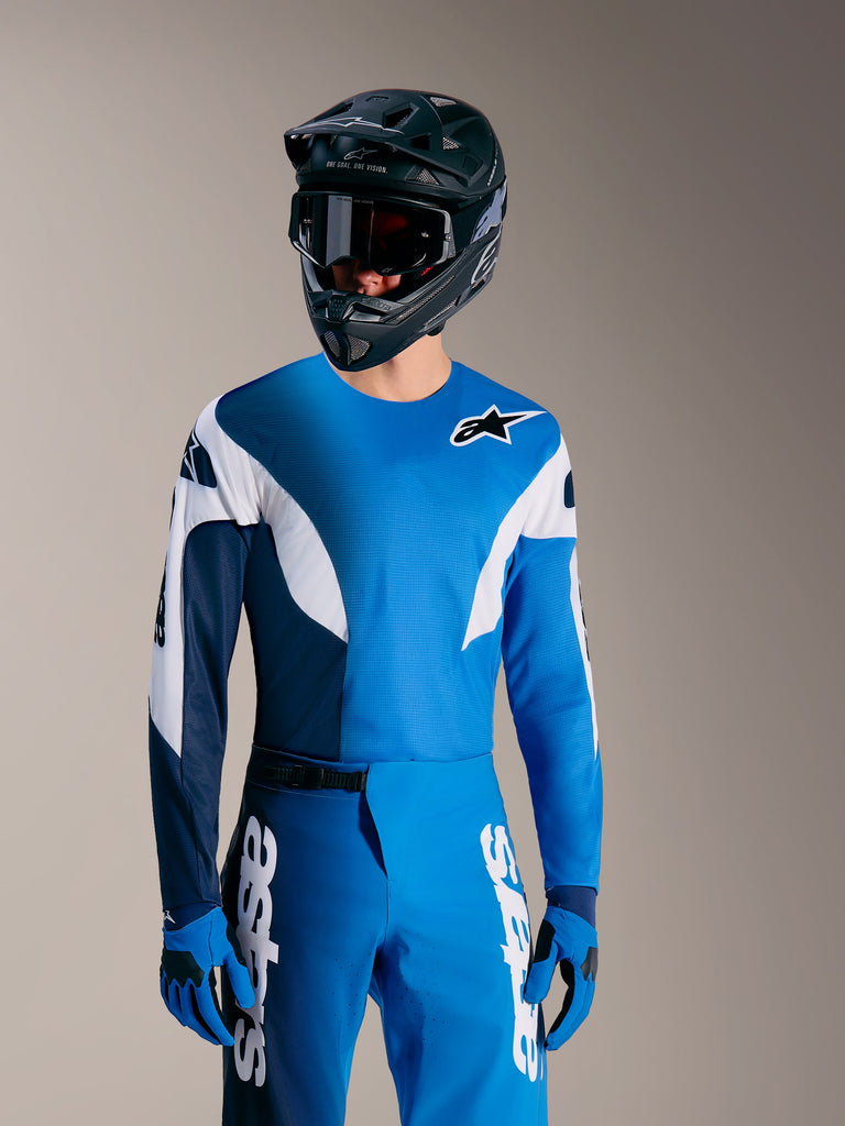 Maglia Alpinestars A-Supra Elite blu sfumato, top da gara MTB leggero con accenti bianchi e stile racing performante.