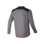 Maglia Alpinestars A-Dura Dri Astar a maniche lunghe, grigio scuro, vista posteriore con pannelli di ventilazione in mesh nero sulle spalle e piccola etichetta rossa sull'orlo, abbigliamento tecnico da mountain bike