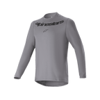 Alpinestars Maglia A-Dura Rocker a maniche lunghe, maglia da ciclismo MTB, grigio scuro, con scritta Alpinestars e logo a stella neri sul petto, coda posteriore più lunga, abbigliamento tecnico per mountain bike