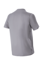 Maglia a maniche corte Alpinestars A-Dura Astar, grigio scuro, vista posteriore della maglia da mountain bike, con coda posteriore più lunga, logo laterale discreto e trama jacquard per prestazioni ciclistiche