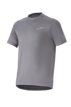 Alpinestars A-Dura Astar Jersey, maglia da mountain bike a maniche corte, grigio scuro con piccolo logo argento sul petto, girocollo e bordo posteriore allungato, tessuto tecnico traspirante, trail riding MTB