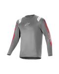 Alpinestars Youth A Supra Astar Maglia a Maniche Lunghe, grigio scuro con accenti bianchi sulle spalle e loghi rossi sulle maniche, logo bianco sul petto, tessuto tecnico traspirante, girocollo, vestibilità atletica per mountain bike