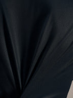 Tessuto jacquard nero della maglia Stella A-Dura Ride: trama traspirante ed elasticità ad alte prestazioni.