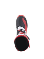 Stivali Alpinestars Tech-T, stivali da moto trial, rosso brillante nero bianco, vista dall'alto che mostra l'apertura interna della caviglia e l'area della punta, con pannelli neri testurizzati, accenti laterali rossi e dettagli bianchi, progettati per prestazioni off-road