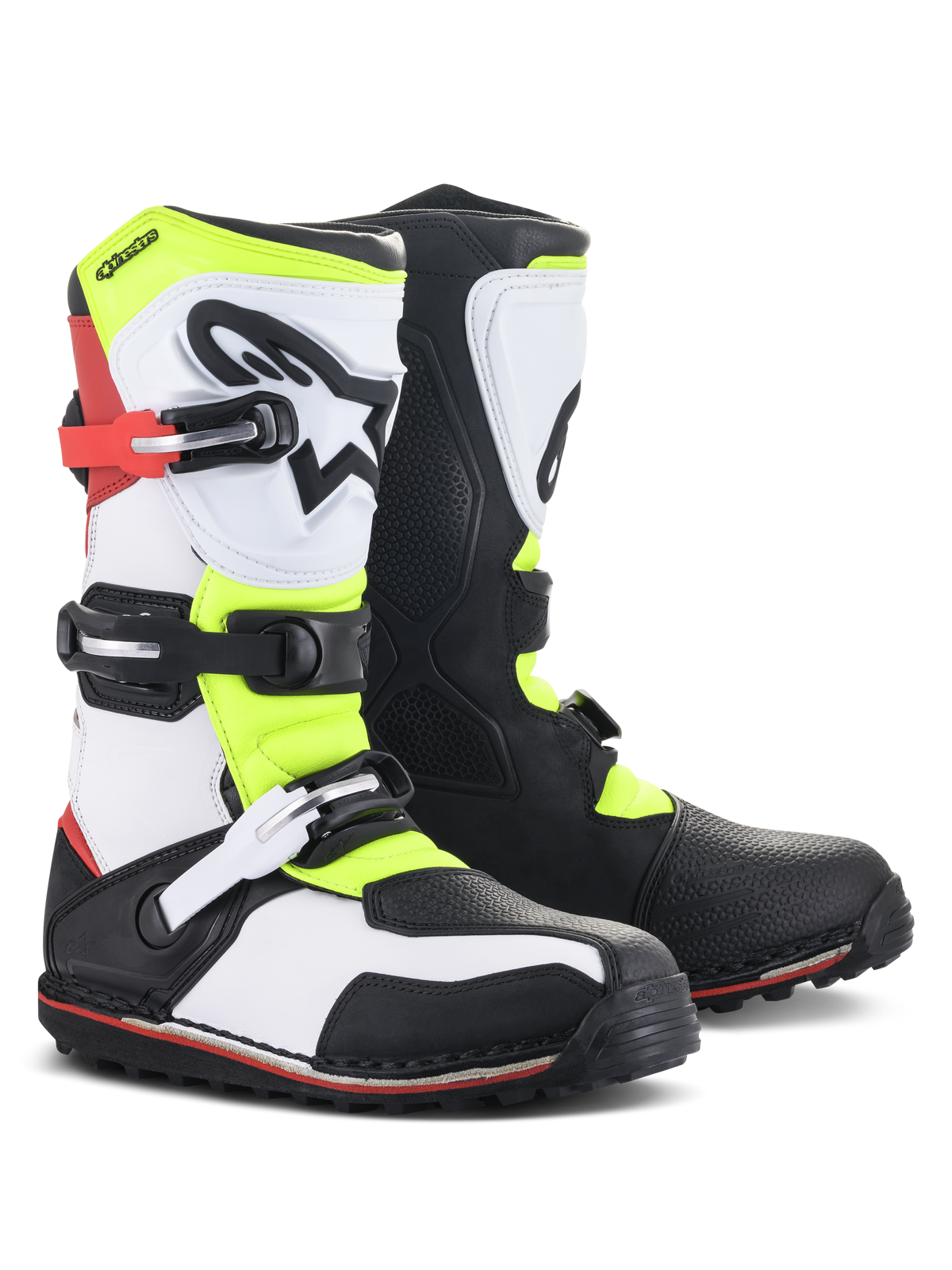 Stivali Alpinestars Tech-T, calzature da moto trial, bianco, rosso, giallo fluo e nero, con paratibia ergonomica e logo a stella, chiusure a fibbia e suola specializzata per il fuoristrada tecnico