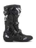 Stivali Alpinestars Tech 10, stivali da motocross, nero, vista laterale con loghi a stella Alpinestars bianchi e branding Tech 10, sistema di chiusura a tre fibbie, robusta struttura in TPU e microfibra per gare off-road professionali