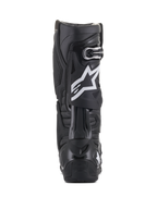 Stivali Alpinestars Tech 10, nero, vista posteriore con logo a stella bianco sul polpaccio, costruzione in resistente guscio in TPU e microfibra, progettati per motocross e guida off-road ad alte prestazioni