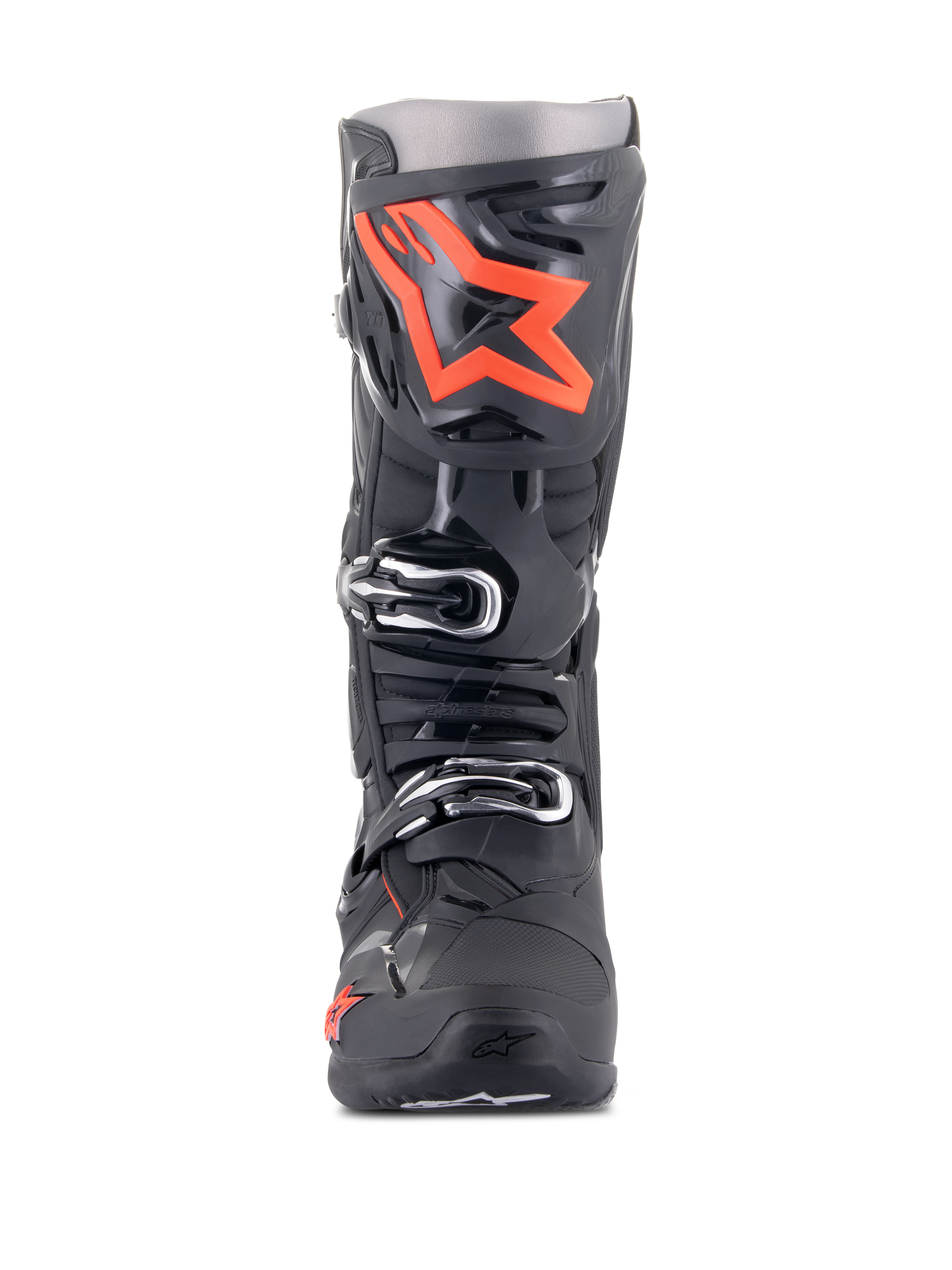 Stivali Alpinestars Tech 10, stivali da motocross, nero e rosso fluo, vista frontale, con un grande logo a stella rosso fluorescente sulla placca parastinchi, fibbie argentate e una resistente struttura in TPU nero.