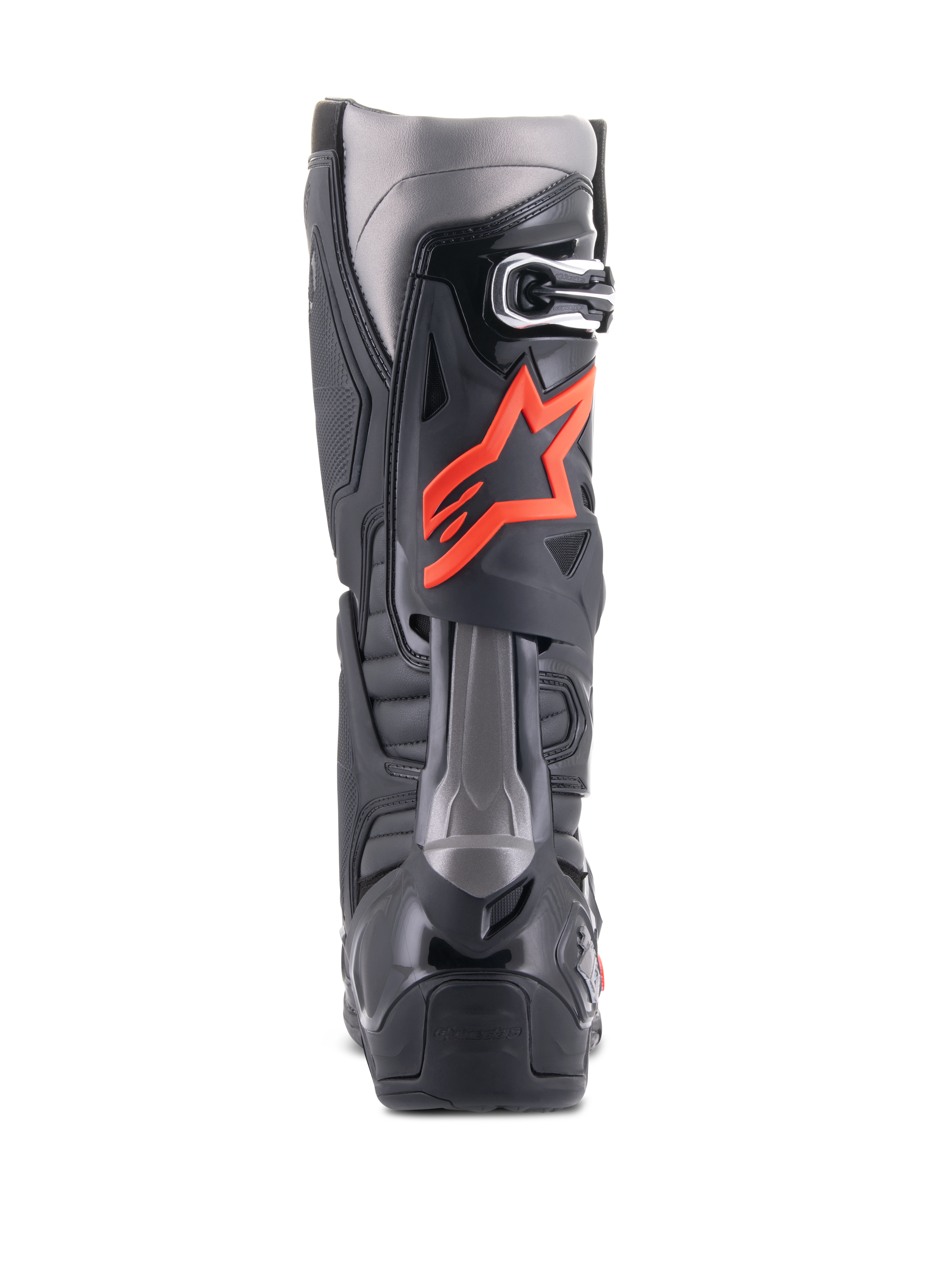 Alpinestars Tech 10 Boots, stivali da motocross, nero e rosso fluo, vista posteriore con calotta tecnica in TPU, pannelli grigio scuro e vistoso logo a stella rosso fluorescente sul polpaccio.