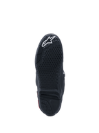 Stivali Alpinestars Tech 10, vista della suola, nero con logo bianco, trama di grip testurizzata, inserto centrale sostituibile, calzature da motocross ad alte prestazioni