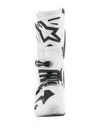 Stivali Alpinestars Tech 10, stivali da motocross bianchi, vista frontale con logo Astars nero sulla placca parastinchi, sistema di chiusura a fibbie multiple e design protettivo aerodinamico per corse fuoristrada