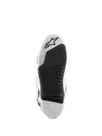 Stivali Alpinestars Tech 10, stivali da motocross, bianco e nero, vista inferiore della suola con trama a grip testurizzato, logo Alpinestars e inserto centrale sostituibile per gare fuoristrada