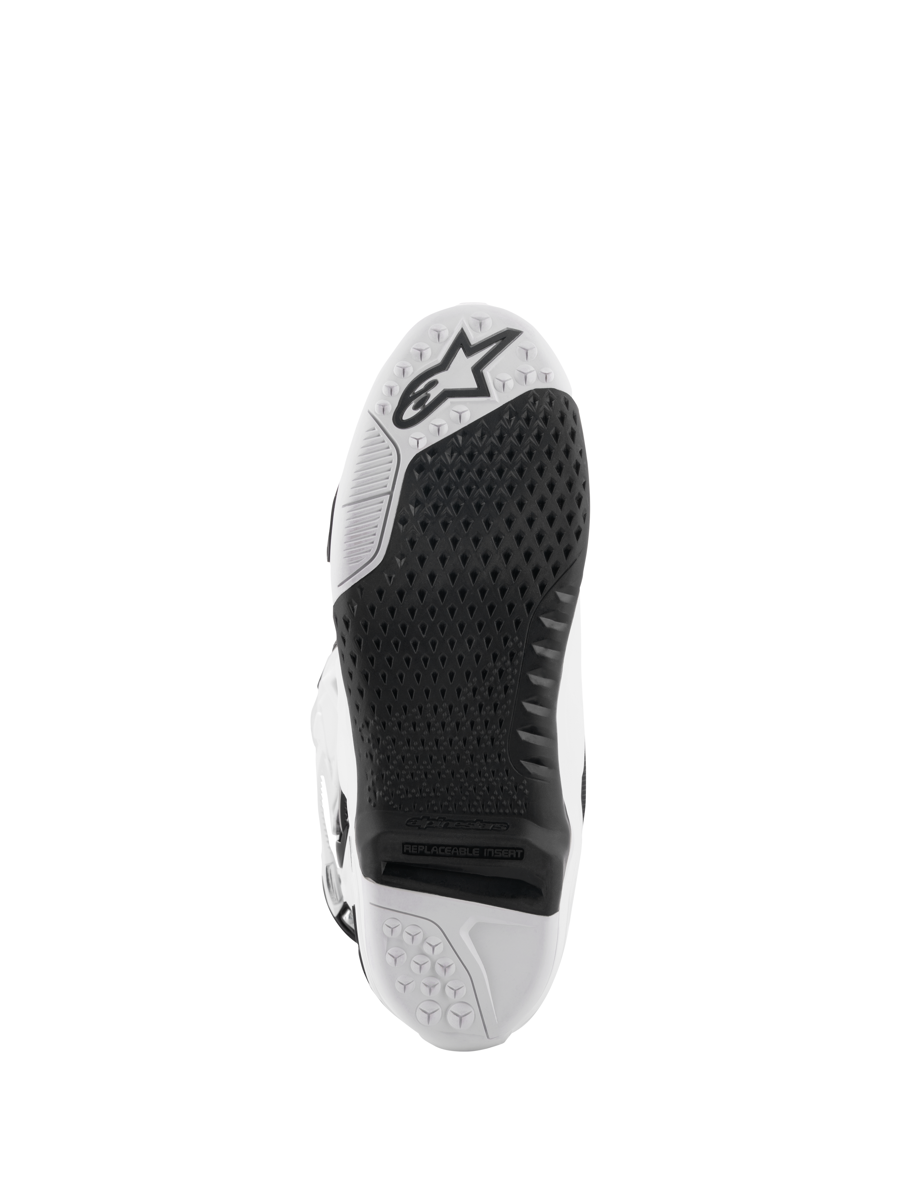 Stivali Alpinestars Tech 10, stivali da motocross, bianco e nero, vista inferiore della suola con trama a grip testurizzato, logo Alpinestars e inserto centrale sostituibile per gare fuoristrada
