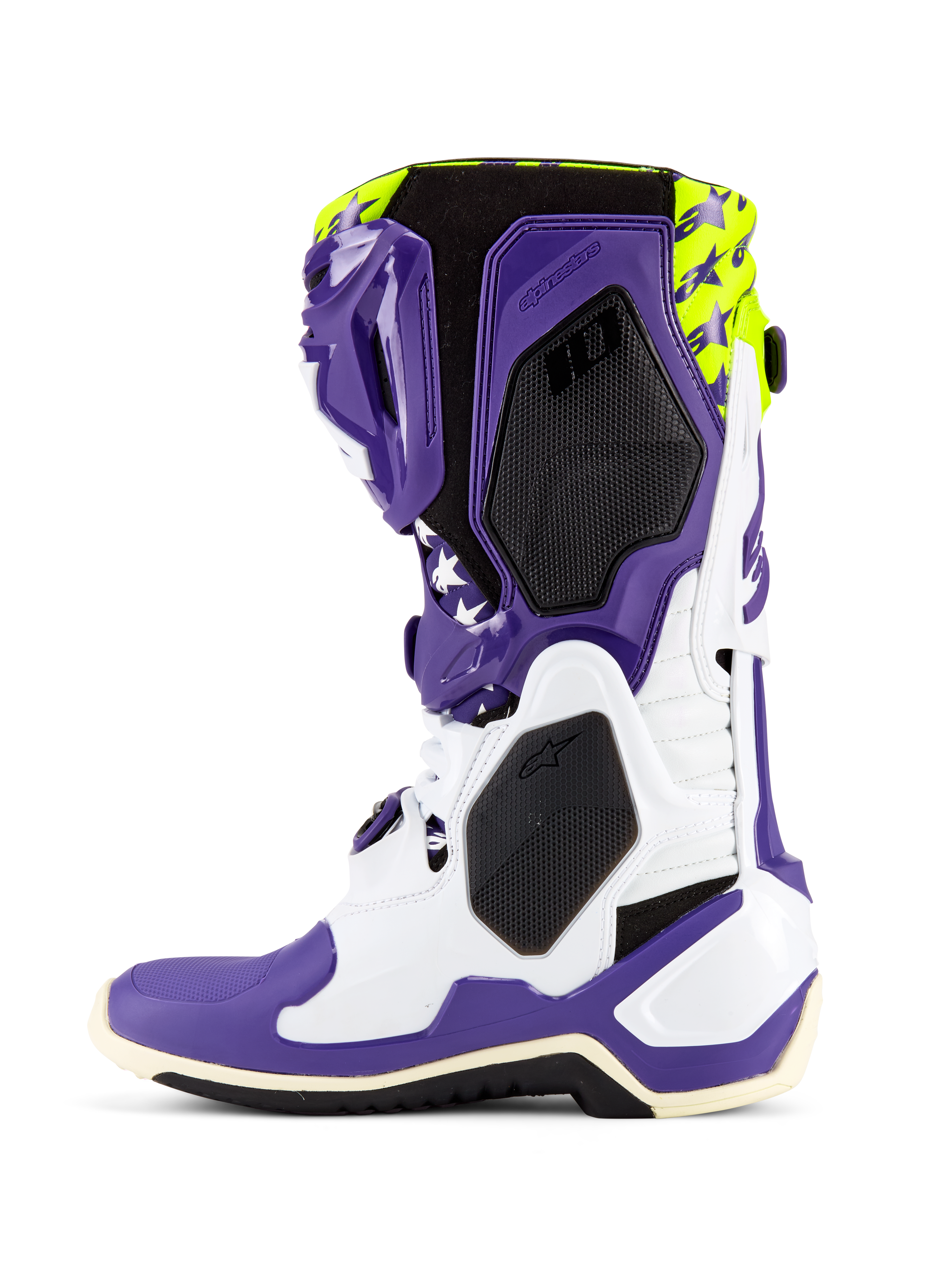 Stivali Alpinestars Tech 10 Dirt Studios® LE, stivali da motocross, bianco, viola e giallo fluo, vista laterale che mostra il telaio in TPU bianco e viola, parte superiore in giallo fluo con grafiche a stella, pannelli neri con trama a nido d'ape e design da corsa off-road di livello professionale