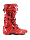 Stivali Alpinestars Tech 10, stivali da motocross, rossi con dettagli bianchi e neri, vista laterale con sistema di chiusura a tre fibbie, scocca in TPU rinforzata, loghi a stella bianchi e marchio tecnologico DHCP