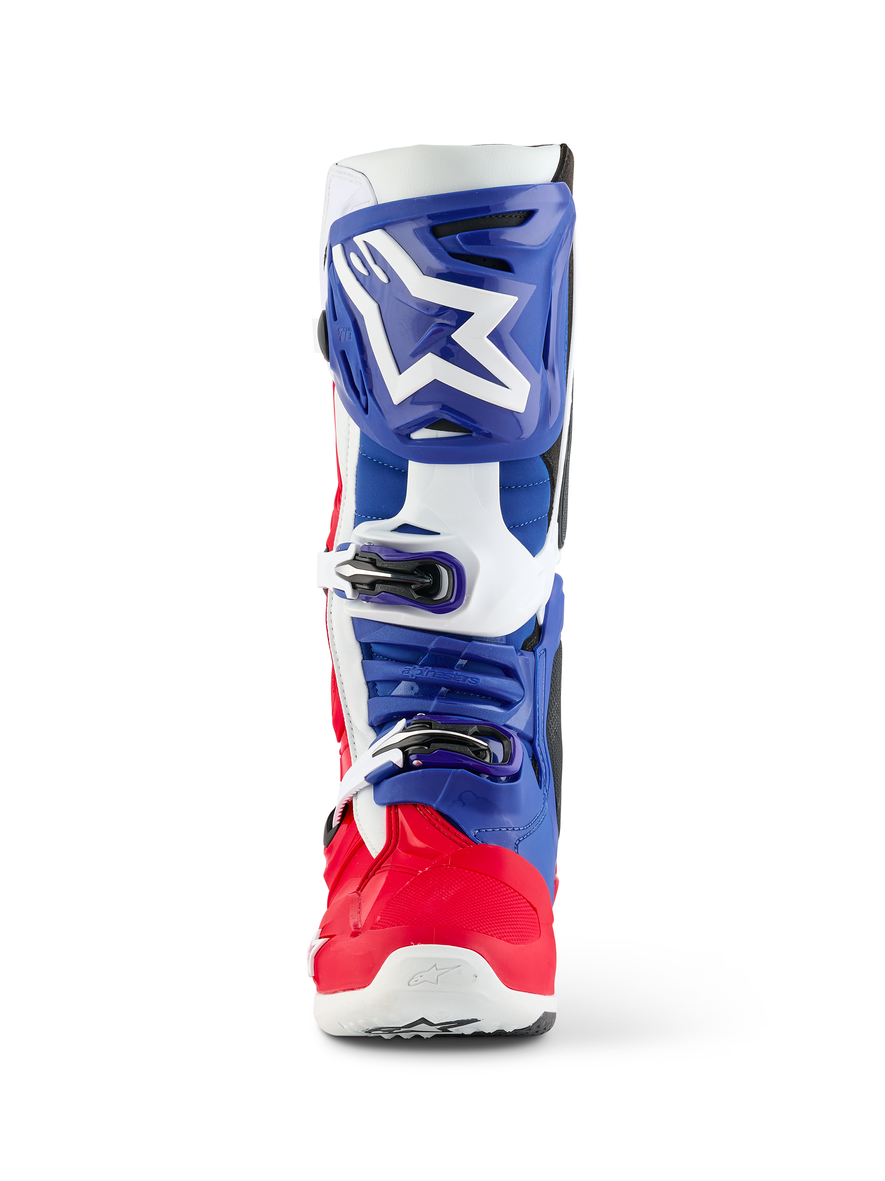 Stivale Alpinestars Limited Edition Fortitude Tech 10, stivale da motocross, rosso acceso, bianco e blu, vista frontale con grande logo a stella bianco sulla placca tibiale blu, sistema di chiusura a tripla fibbia e scocca del piede rosso vibrante, progettato per prestazioni off-road d'élite