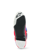 Alpinestars Limited Edition Fortitude Tech 10, vista della suola dello stivale da motocross, motivo di aderenza testurizzato nero e bianco, inserto centrale sostituibile, accenti rosso acceso, bianco e blu, struttura resistente per prestazioni fuoristrada