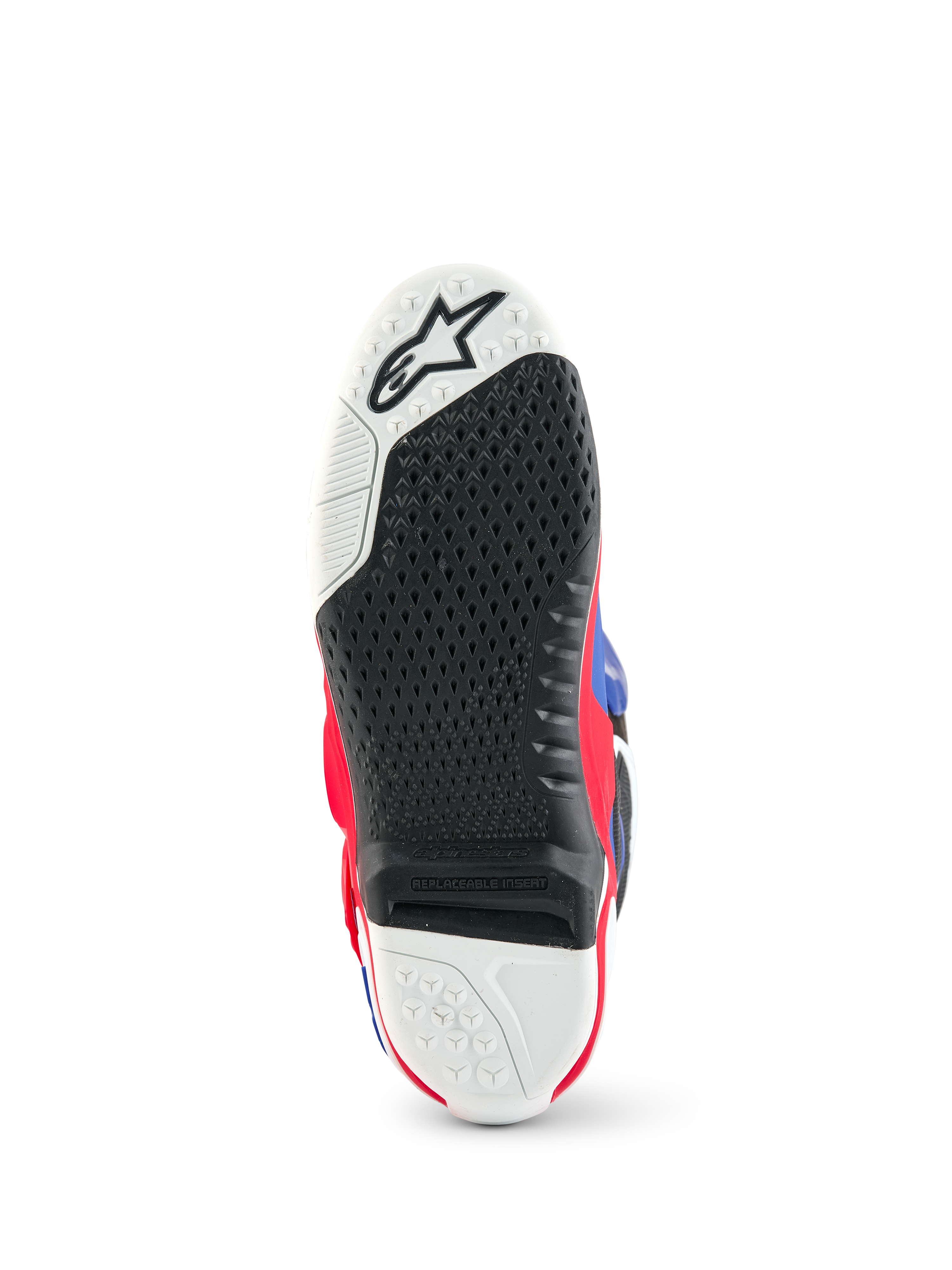 Alpinestars Limited Edition Fortitude Tech 10, vista della suola dello stivale da motocross, motivo di aderenza testurizzato nero e bianco, inserto centrale sostituibile, accenti rosso acceso, bianco e blu, struttura resistente per prestazioni fuoristrada