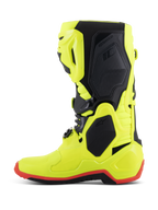 Stivali Alpinestars Tech 10, stivali da motocross, giallo fluo, nero e rosso fluo, profilo laterale, costruzione giallo neon brillante con pannelli protettivi neri e dettaglio della suola rosso fluo, equipaggiamento ad alte prestazioni per gare fuoristrada