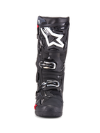 Alpinestars Tech 10 Enduro Boots, stivali da motocross, nero, vista frontale con logo a stella bianco sullo stinco, fibbie argentate, finitura nera lucida con pannelli protettivi robusti, calzature ad alte prestazioni per la guida fuoristrada