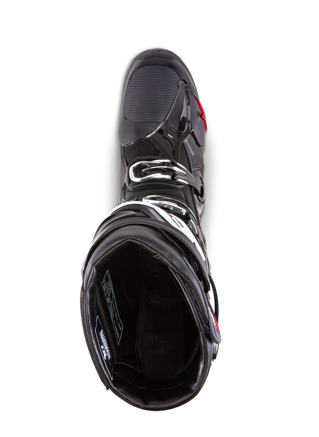 Stivali Alpinestars Tech 10 Enduro, stivali da motocross, nero, vista dall'alto che mostra la fodera interna, sistema di chiusura a tripla fibbia e area della punta rinforzata, progettati per gare enduro e off-road ad alte prestazioni