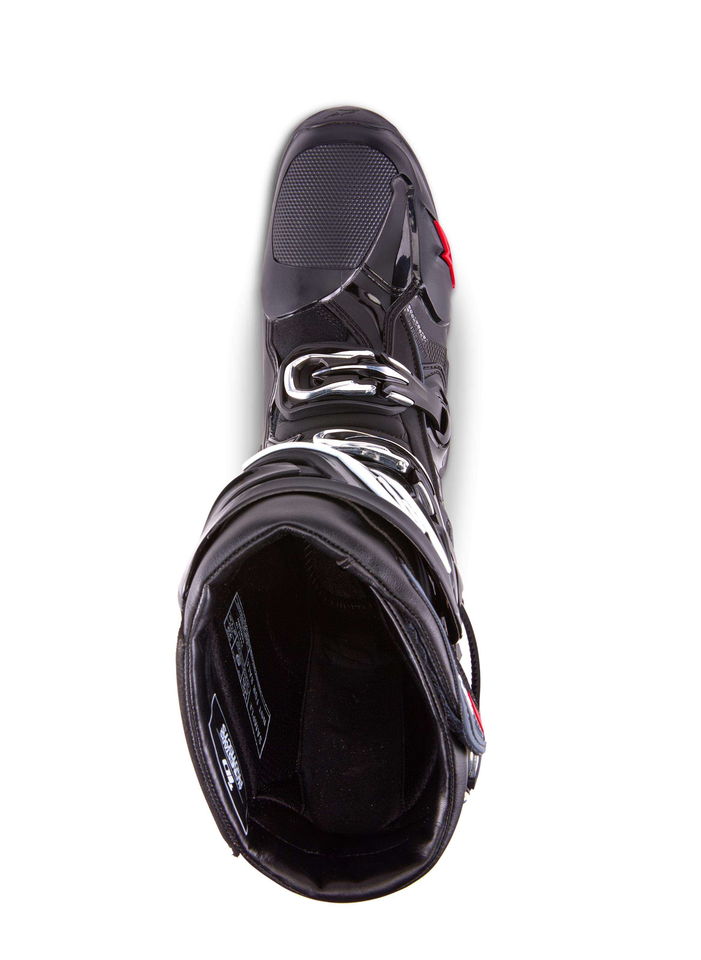 Stivali Alpinestars Tech 10 Enduro, stivali da motocross, nero, vista dall'alto che mostra la fodera interna, sistema di chiusura a tripla fibbia e area della punta rinforzata, progettati per gare enduro e off-road ad alte prestazioni