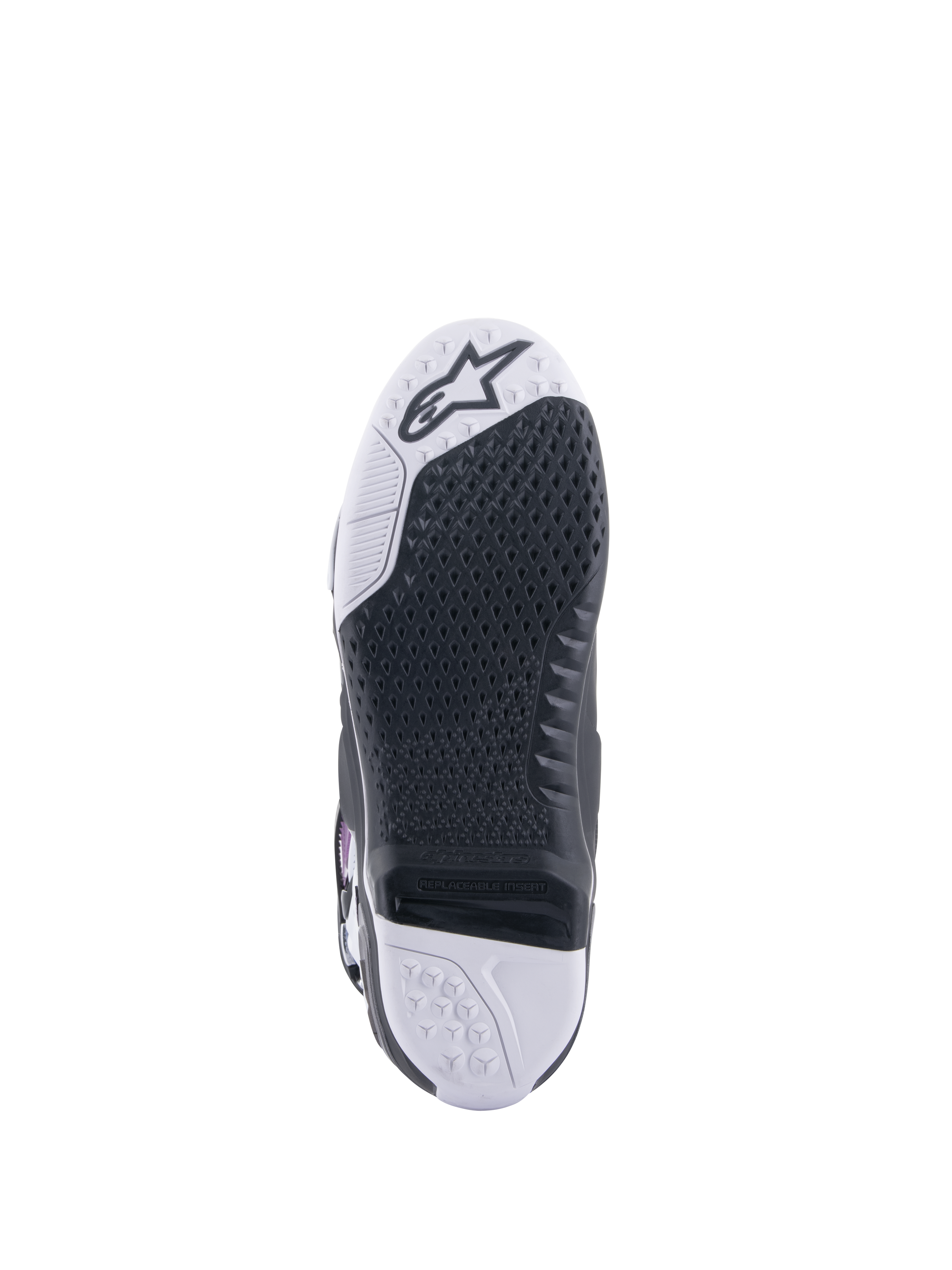 Stivali Alpinestars Tech 10 Supervented, stivali da motocross, vista della suola, trama grip a nido d'ape nera su base bianca e nera, inserto centrale sostituibile, con il logo Alpinestars sulla punta