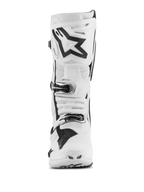 Alpinestars Tech 10 Supervented, stivali da motocross, bianchi con accenti neri, vista frontale con grande logo Astar nero sulla placca tibiale, sistema di chiusura a fibbia e sezioni traforate per la ventilazione