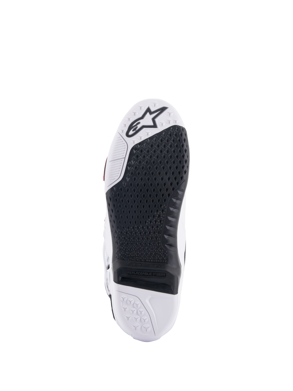 Stivali Alpinestars Tech 10 Supervented, vista della suola bianca e nera, con design a nido d'ape allungato, inserto centrale sostituibile nero, punta bianca con logo a stella Alpinestars, ottimizzati per il controllo sulle pedane da motocross.