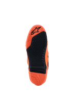 Stivali Alpinestars Tech 10 Supervented, arancione fluo e nero, vista della suola con grip in gomma nera testurizzata, inserto centrale sostituibile e logo in rilievo sul battistrada arancione, progettati per prestazioni motocross