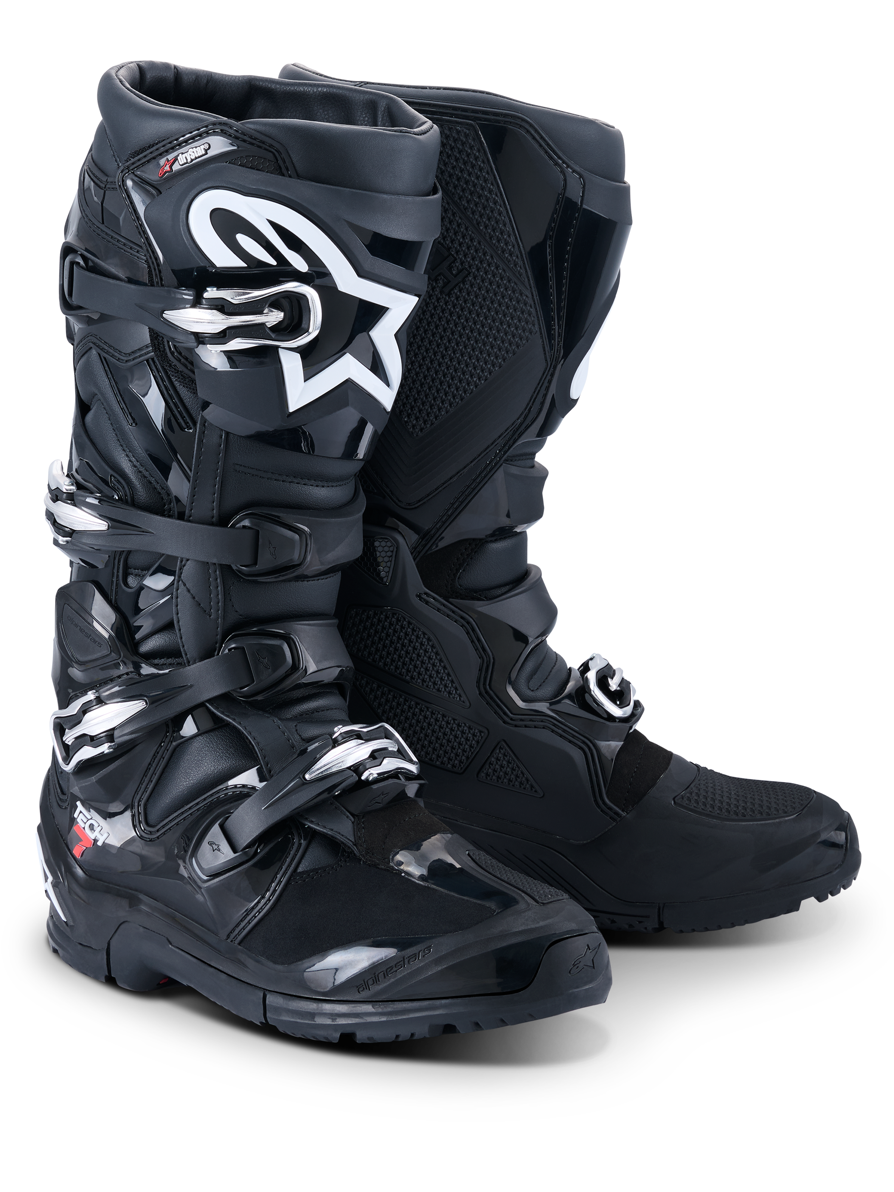 Stivali Alpinestars Tech 7 Enduro Drystar® 2026, stivali professionali da motocross ed enduro, nero, con sistema di chiusura a quattro fibbie, logo Astar bianco sullo stinco, robusti pannelli protettivi in TPU e suola specializzata per il grip fuoristrada.