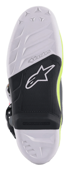 Stivali Alpinestars Tech 7, stivali da motocross, vista dettagliata della suola con design in mescola bianca e nera, inserto per pedana sostituibile, grip testurizzato con logo a stella Alpinestars e accenti giallo fluo