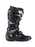 Alpinestars Tech 7, stivali da motocross fuoristrada, nero con fibbie argentate e accenti bianchi, vista laterale con quattro fibbie in alluminio a sgancio rapido, robusta calotta in TPU e pannelli testurizzati per protezione off-road
