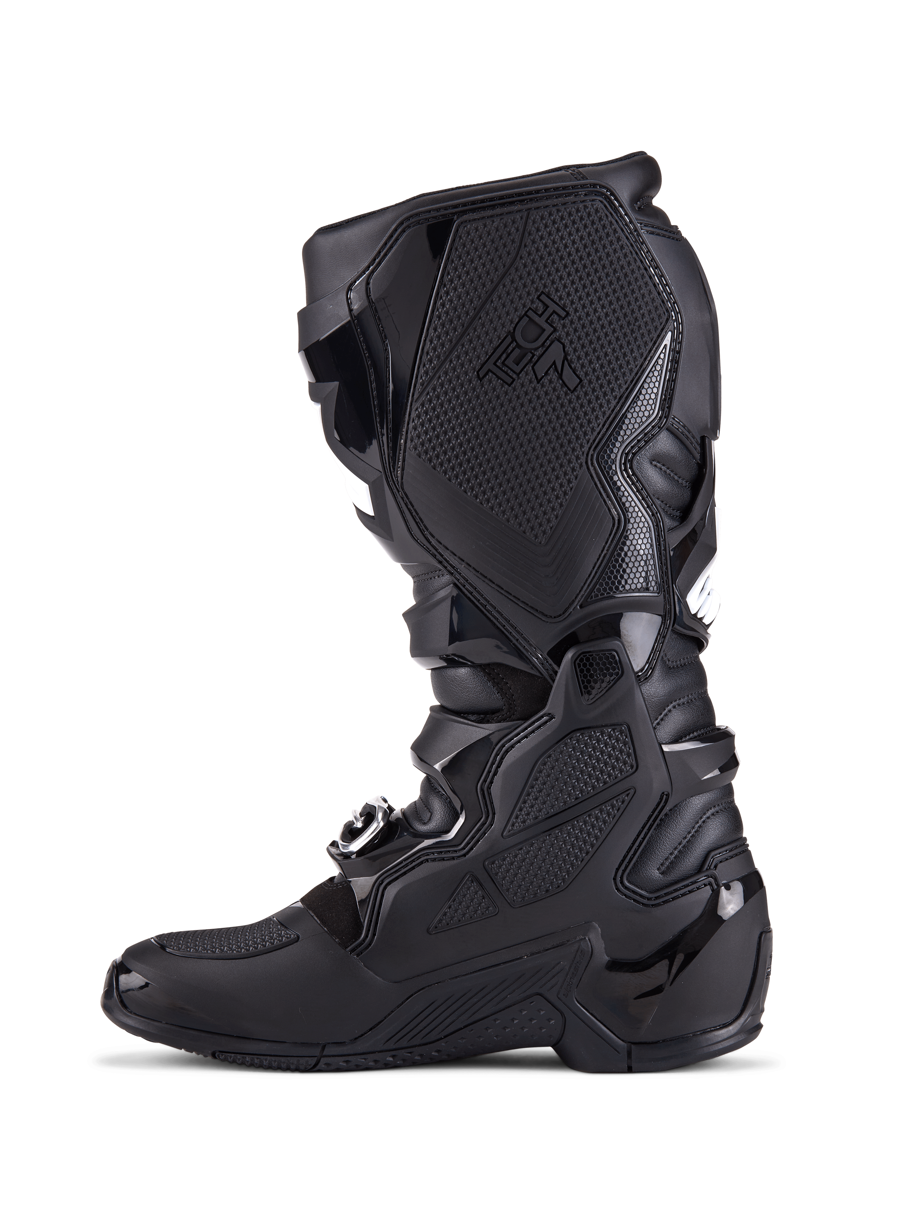 Alpinestars Tech 7 Boots, stivali da motocross, completamente neri, vista laterale con piastre di protezione in TPU, sistema di chiusura con fibbie e pannelli grip testurizzati, calzature professionali per la guida fuoristrada