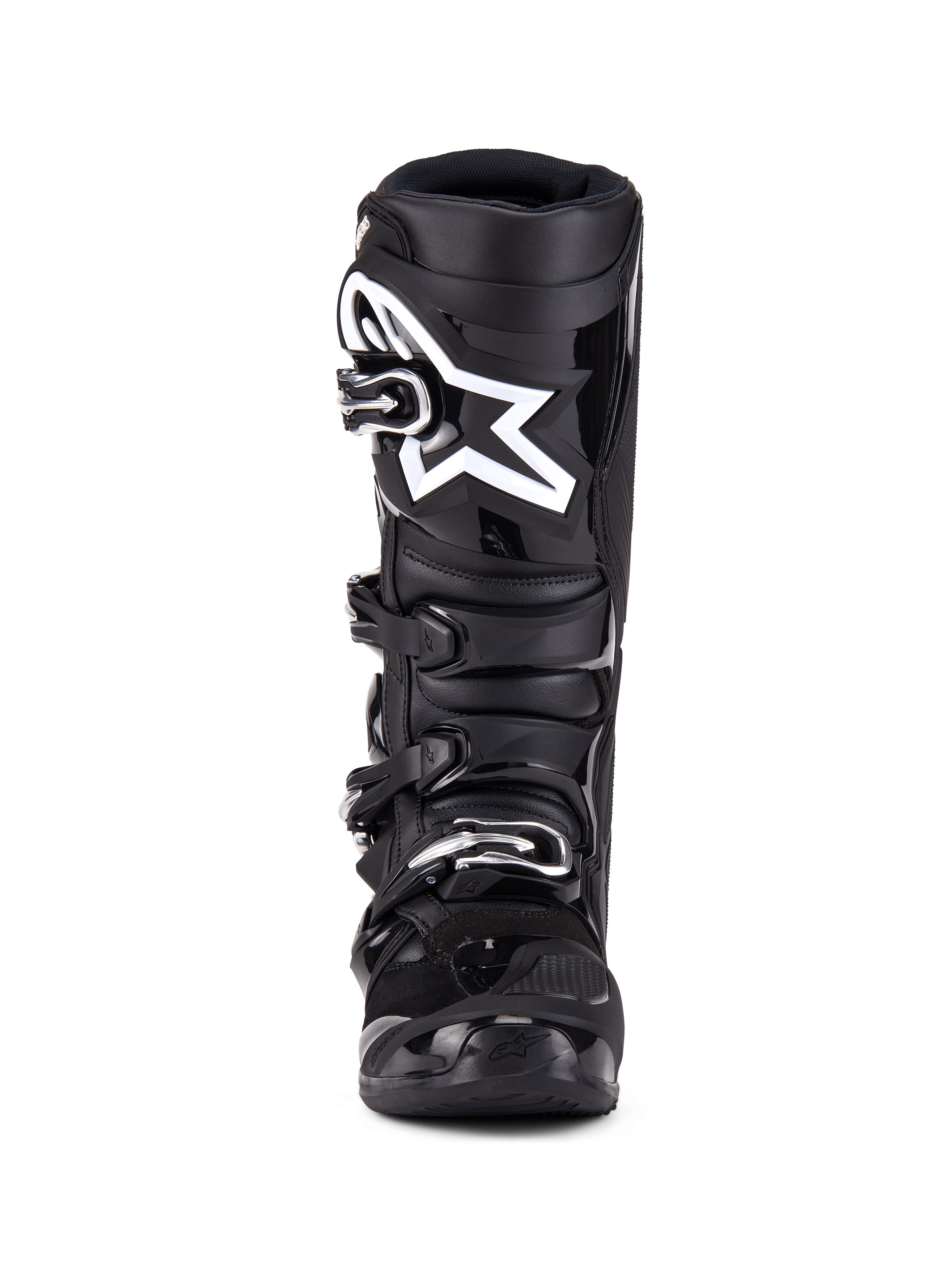 Stivali Alpinestars Tech 7, stivali da motocross, nero, vista frontale con sistema di chiusura a quattro fibbie, logo a stella Alpinestars bianco in evidenza sulla placca parastinchi, scocca in TPU resistente e protezione rinforzata per corse off-road